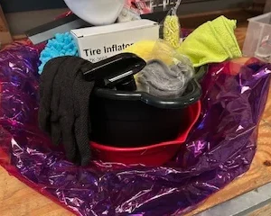 Tire inflator and cleaning cloths